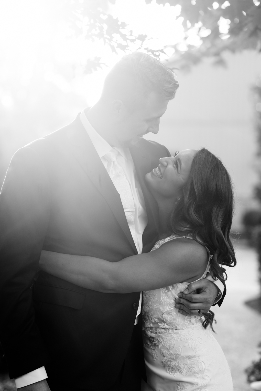 bride and groom outside at bella sala wedding venue in tiffin iowa