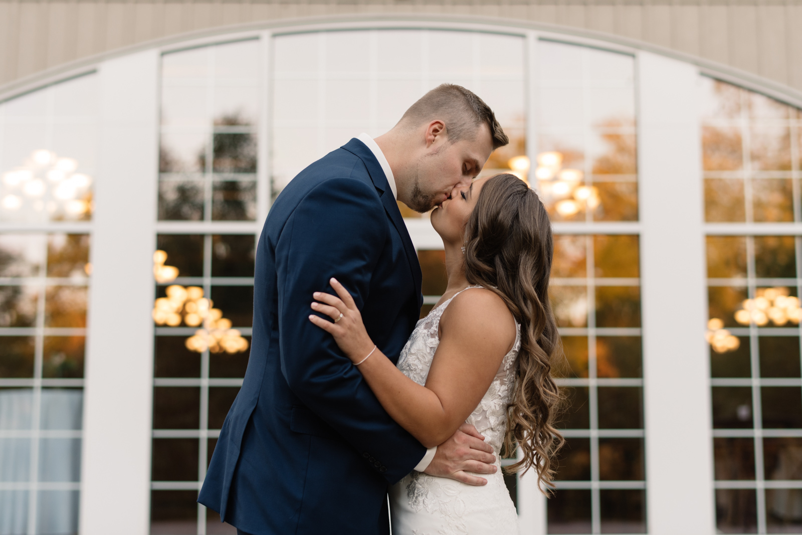 bride and groom outside at bella sala wedding venue in tiffin iowa