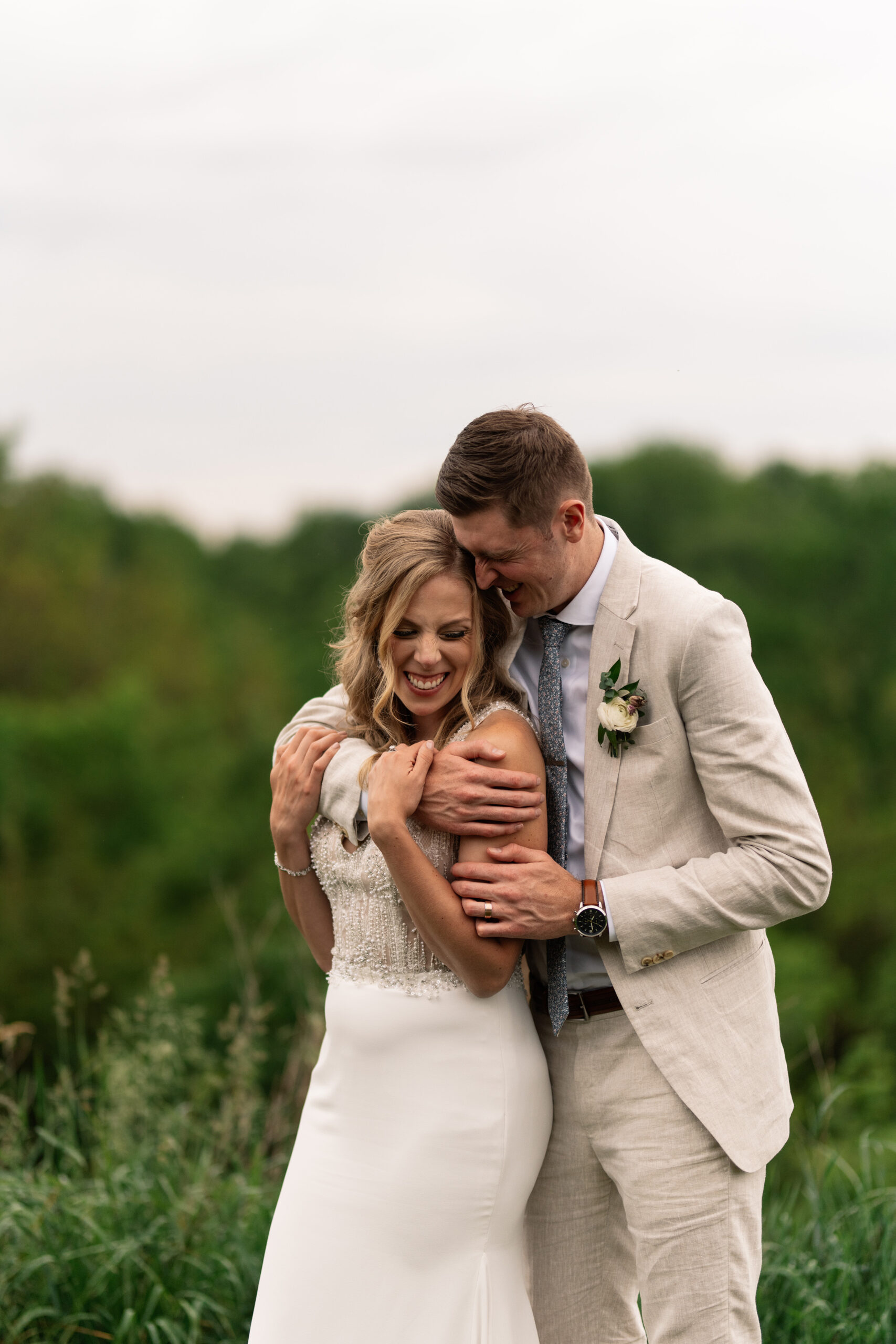 couple under twinkly light wedding arch brick wall olympic south side theater wedding venue cedar rapids