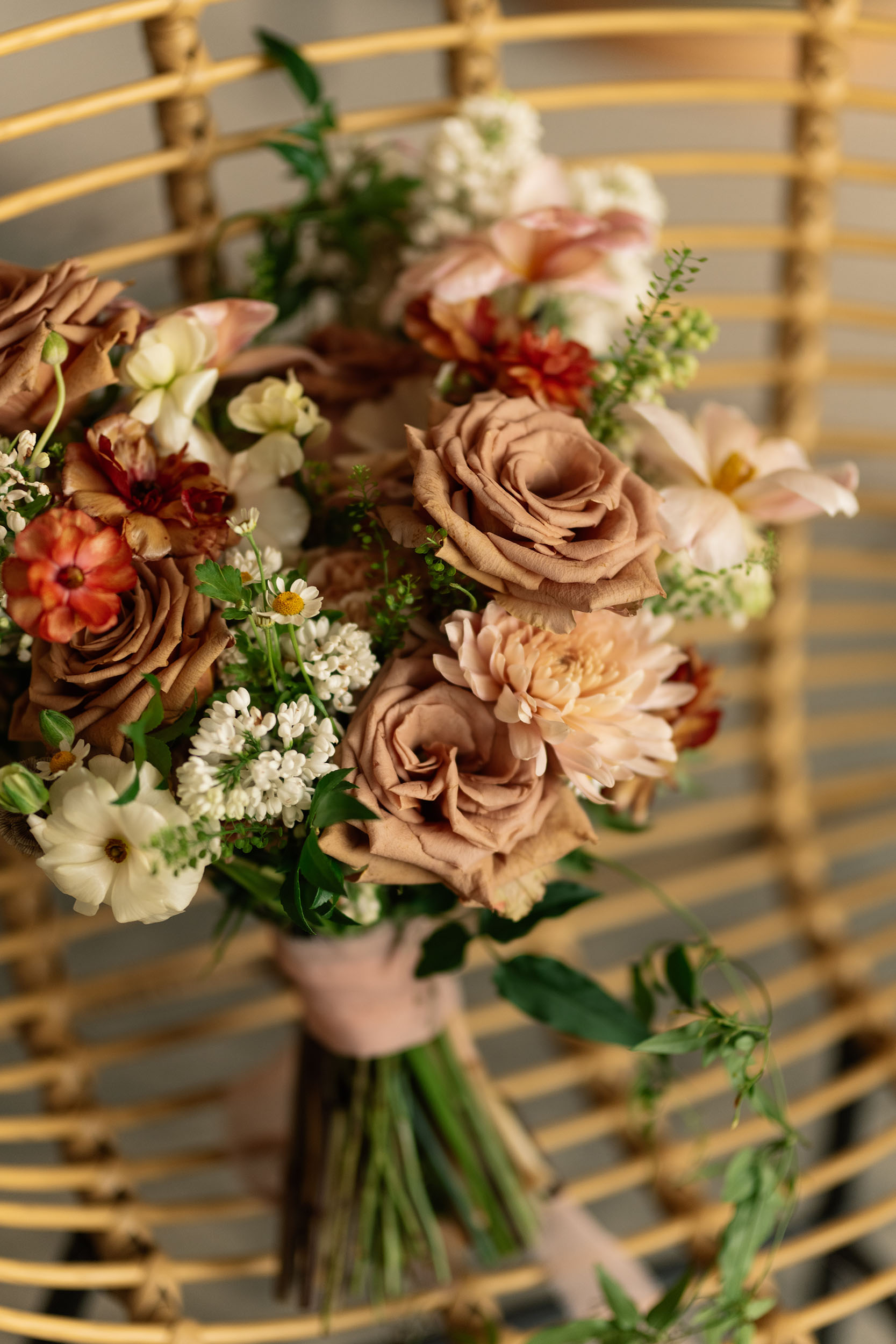 red and pink floral bouquet olympic south side theater wedding venue cedar rapids