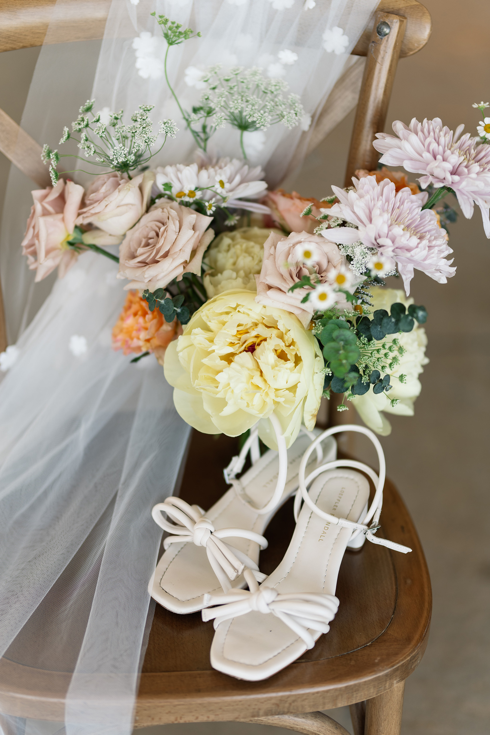 red and pink floral bouquet olympic south side theater wedding venue cedar rapids