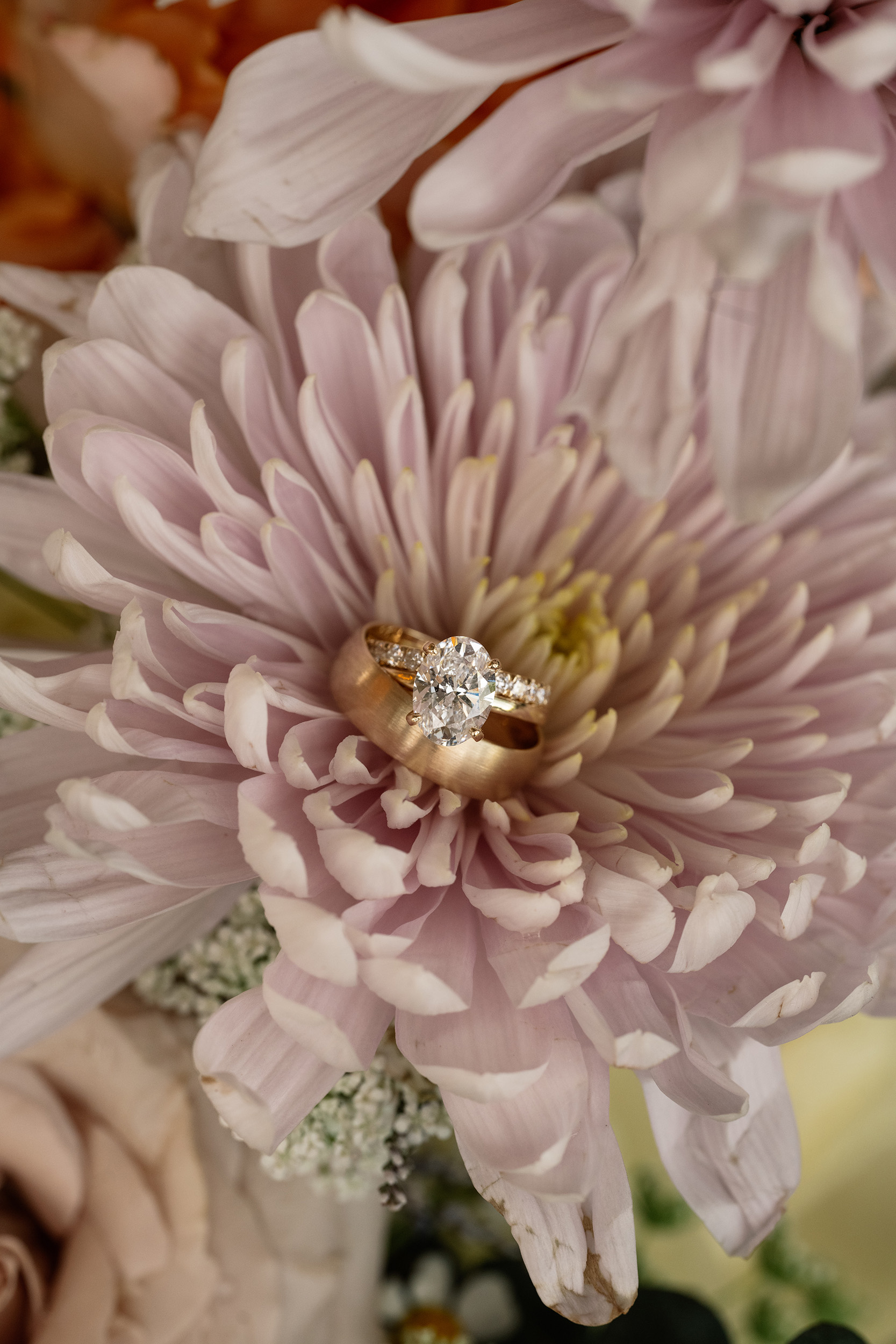 red and pink floral bouquet olympic south side theater wedding venue cedar rapids