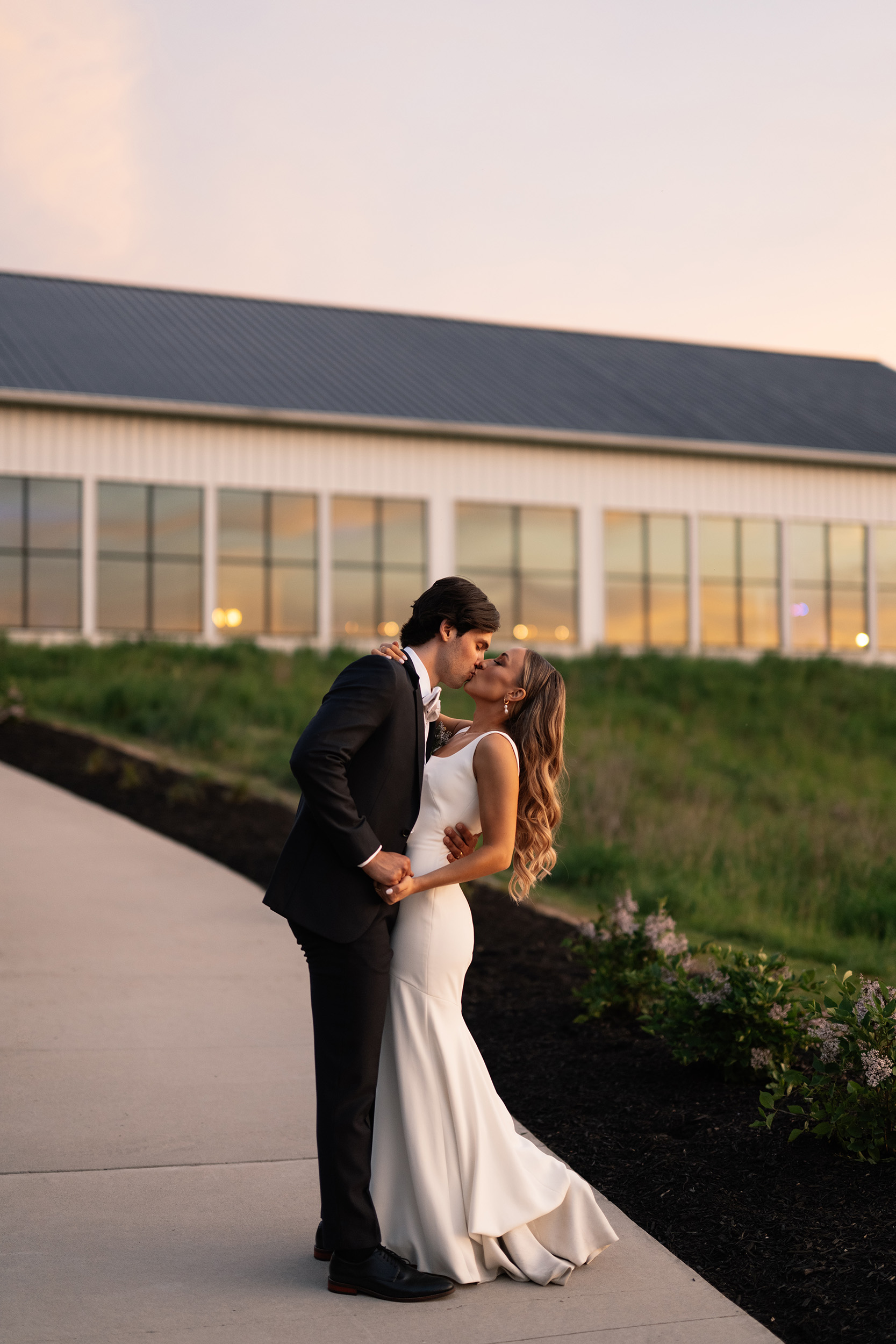 red and pink floral bouquet olympic south side theater wedding venue cedar rapids