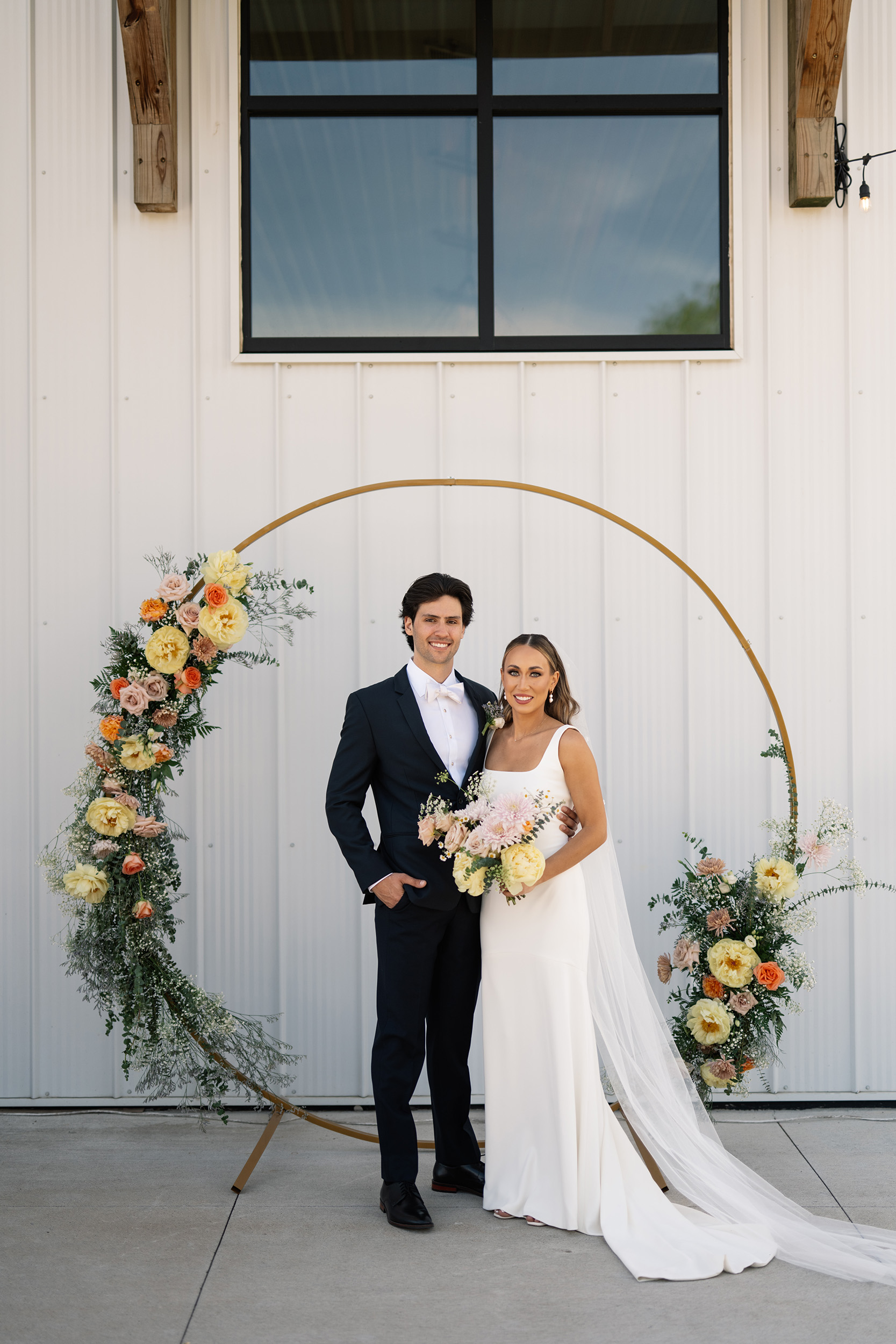 red and pink floral bouquet olympic south side theater wedding venue cedar rapids