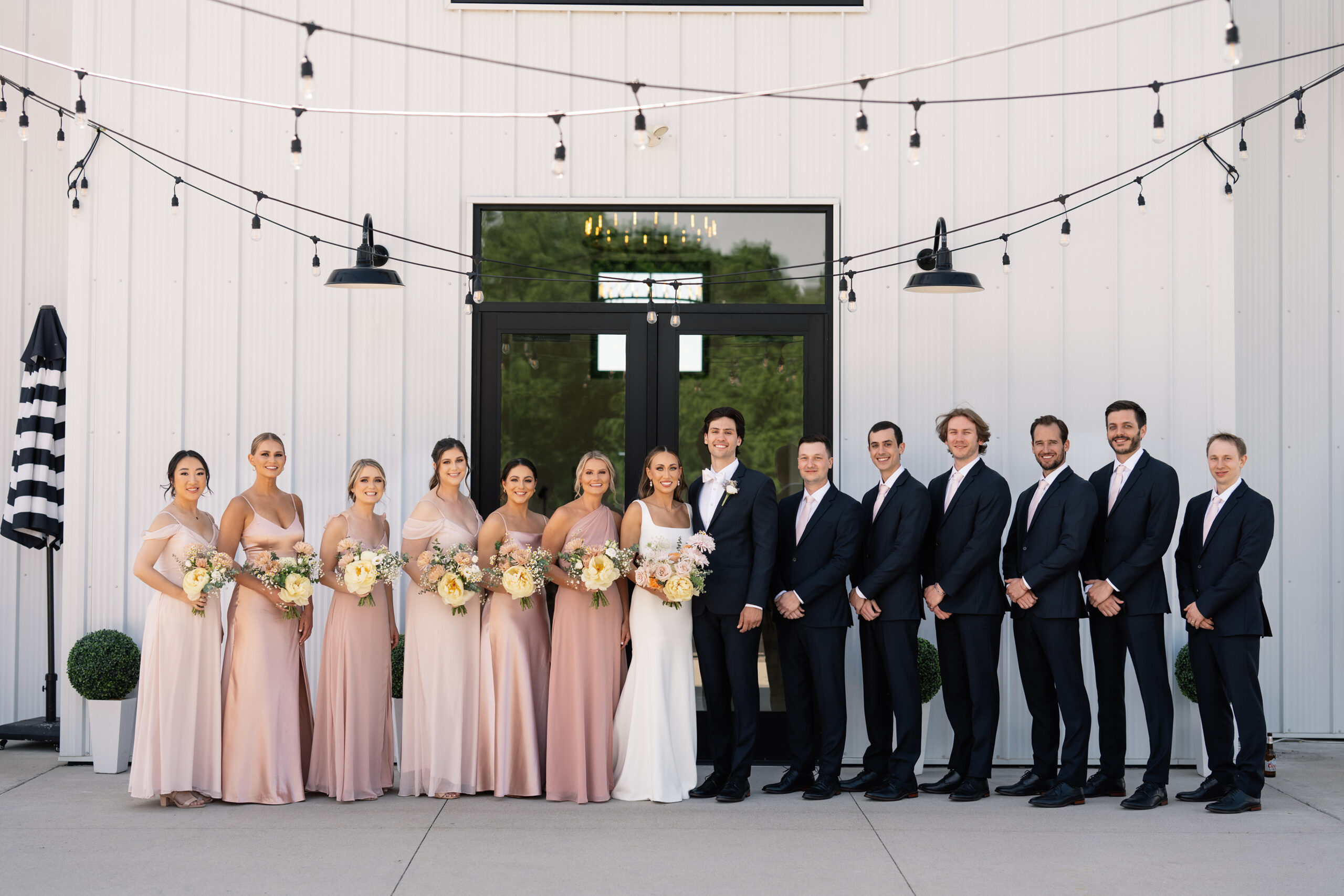 red and pink floral bouquet olympic south side theater wedding venue cedar rapids