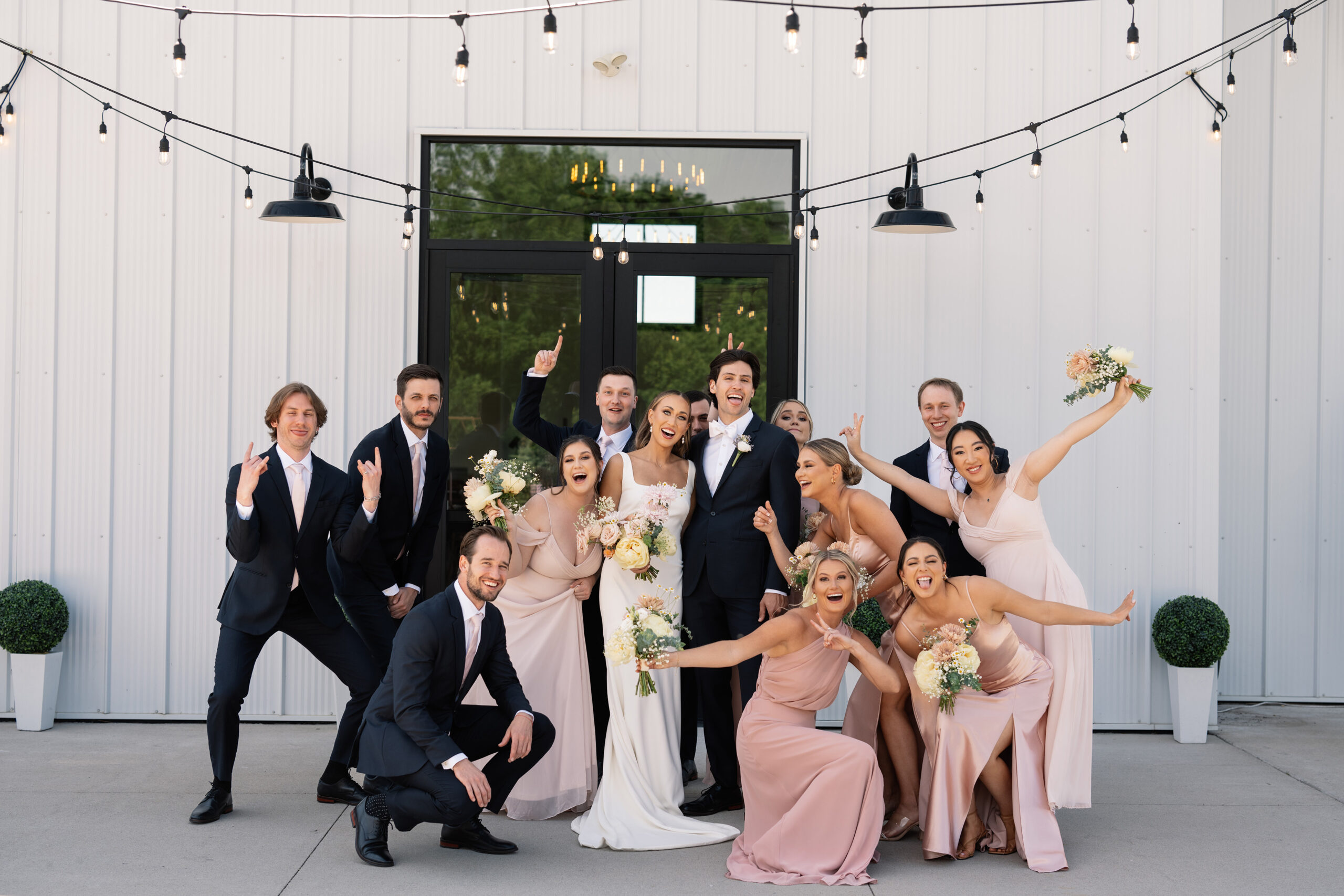 red and pink floral bouquet olympic south side theater wedding venue cedar rapids