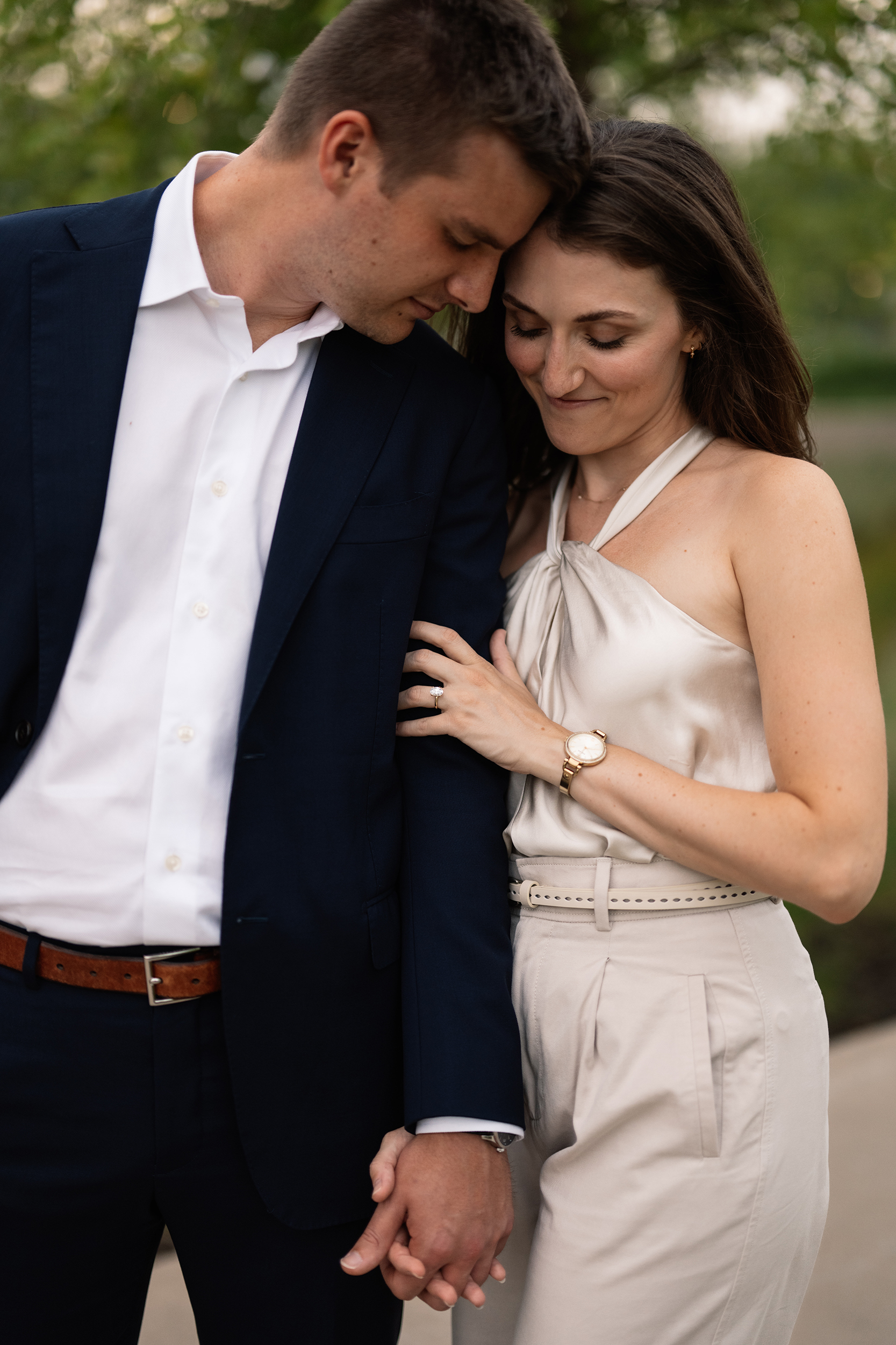 couple under twinkly light wedding arch brick wall olympic south side theater wedding venue cedar rapids