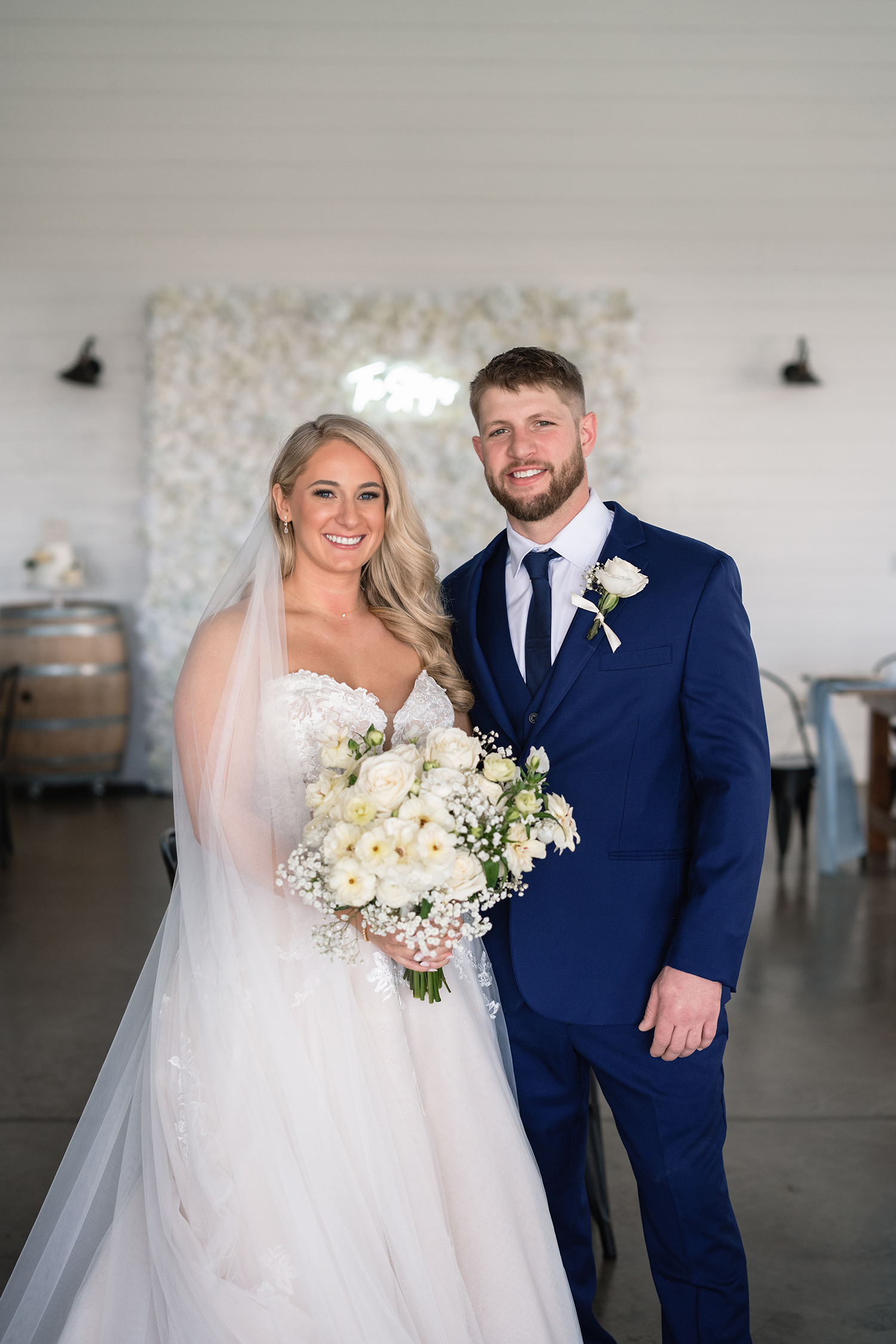 red and pink floral bouquet olympic south side theater wedding venue cedar rapids