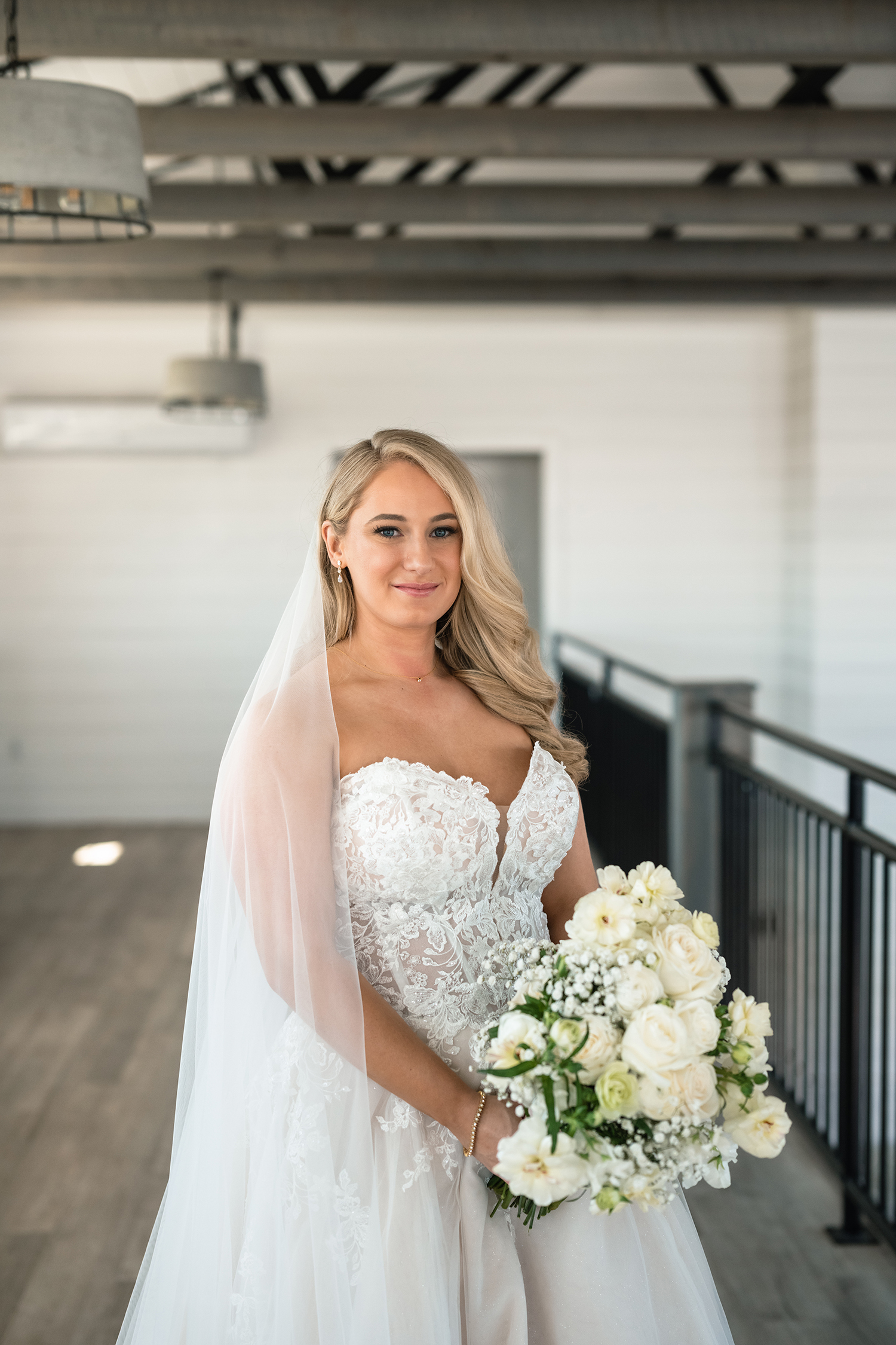 red and pink floral bouquet olympic south side theater wedding venue cedar rapids